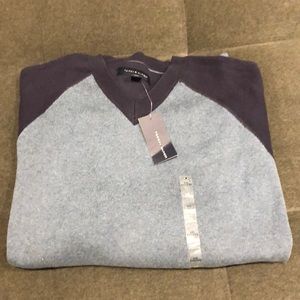 Brand new!  Tommy Hilfiger Sweater with tags.